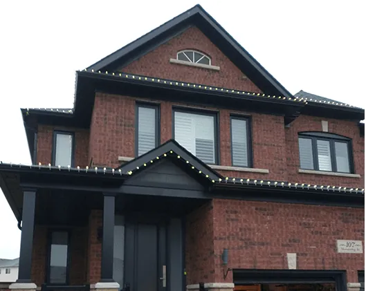 Two-storey brick home with new replacement windows