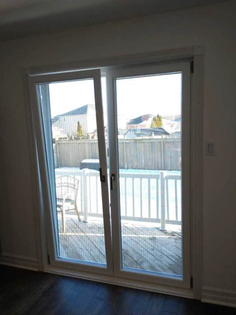 White sliding patio door seen from inside