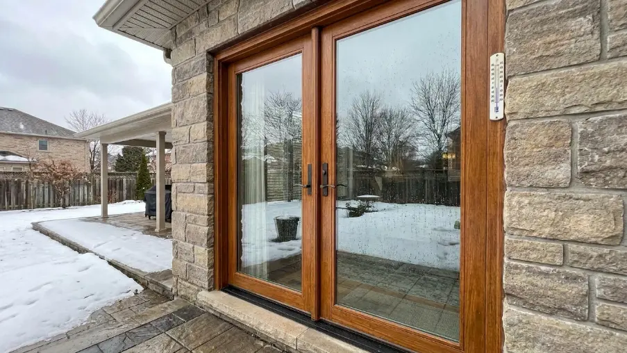 Energy-efficient patio doors designed to withstand Ontario weather with insulated glass, durable frames, and weather-resistant seals