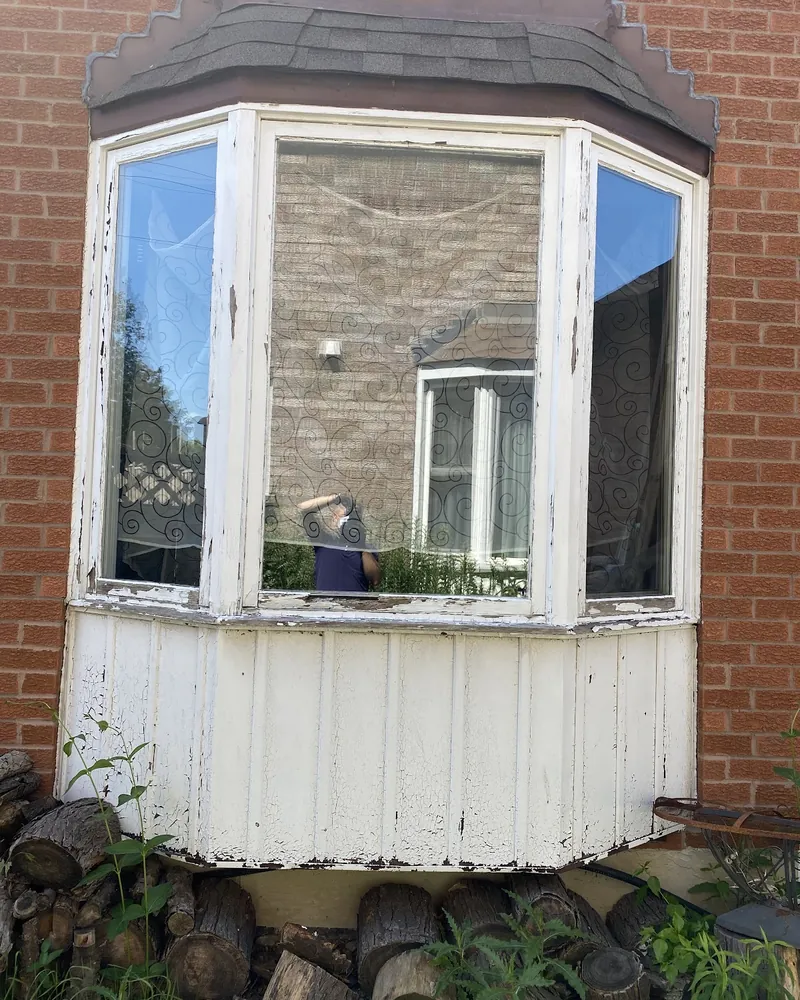 Worn Bay Window Fully Replaced: before Bay window on a brick house before replacement