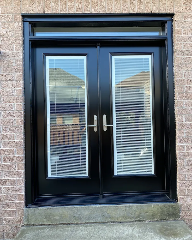 Patio opening with a transom window after replacement in Brampton
