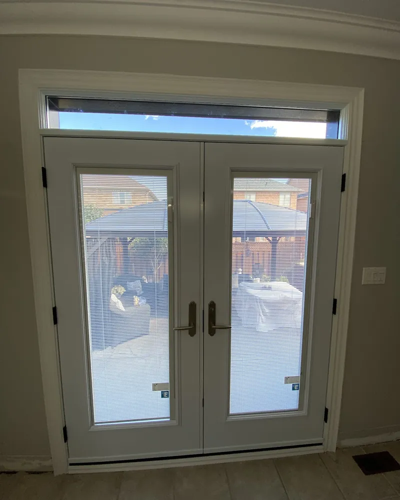 French Doors With Transom, Inside View: after Patio doors seen from the kitchen after replacement in Brampton
