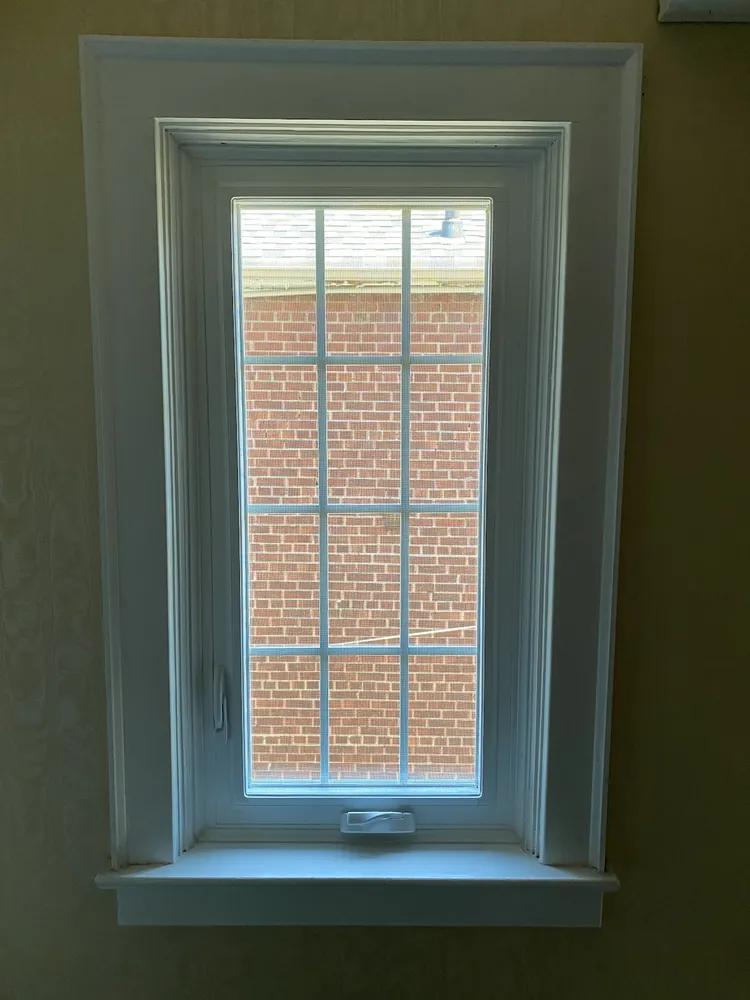 New casement window with colonial grilles