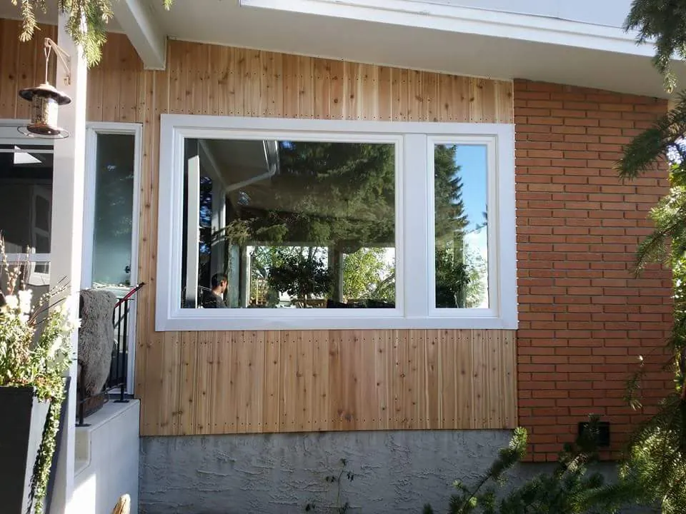 New picture and casement windows on cedar and brick