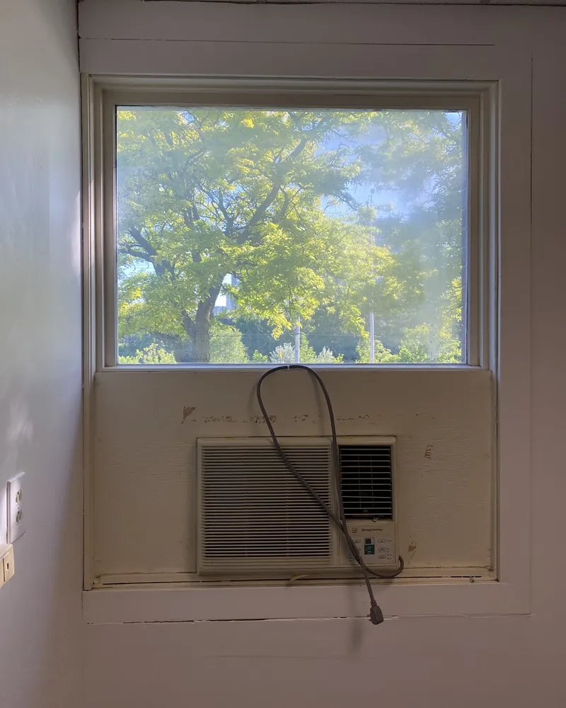 Office window seen from inside before replacement