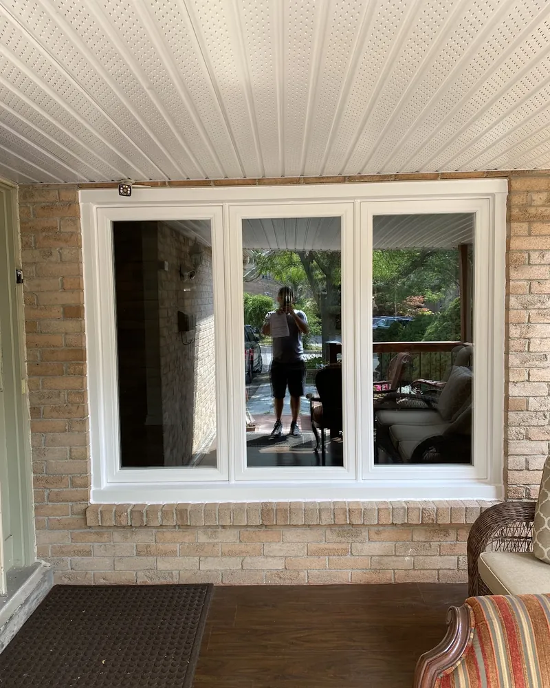 Porch Windows Replaced: after Three windows on a covered porch after replacement