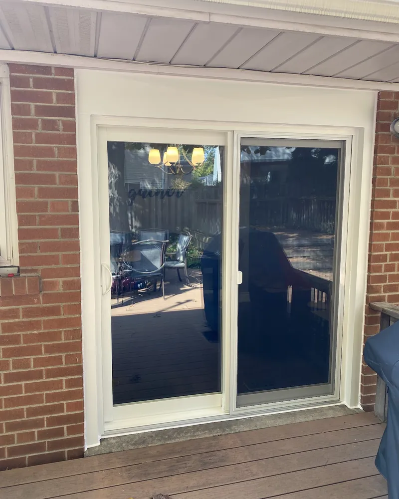 Sliding patio door on a covered deck after replacement