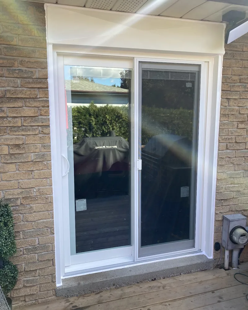 Sliding Patio Door on a Stone Wall: after Sliding patio door off a wood deck after replacement