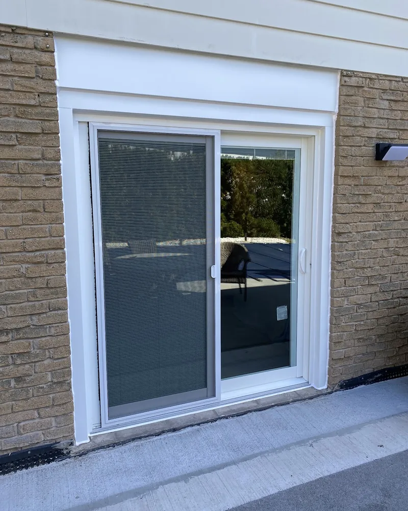 Walkout Patio Door Replacement: after Lower-level walkout patio door after replacement
