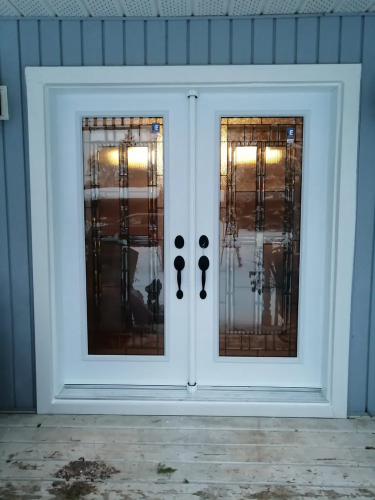 White French doors with decorative glass